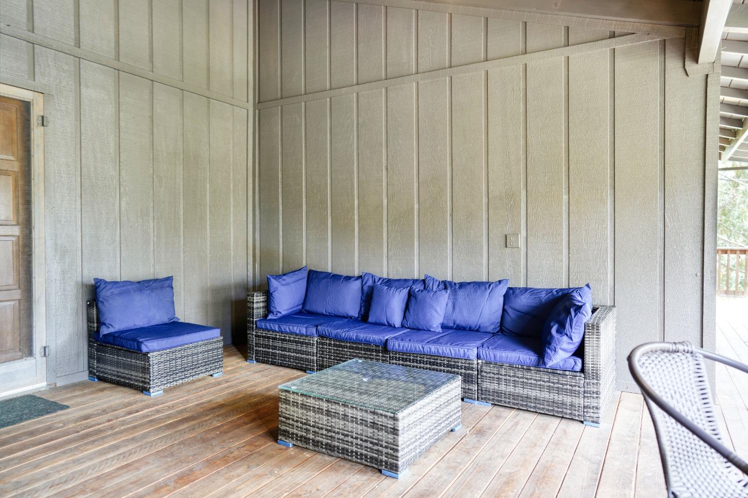 42917 Scenic Drive Oakhurst, CA 93644 - Photo 7 of 50 a living room with furniture a couch and wooden floor
