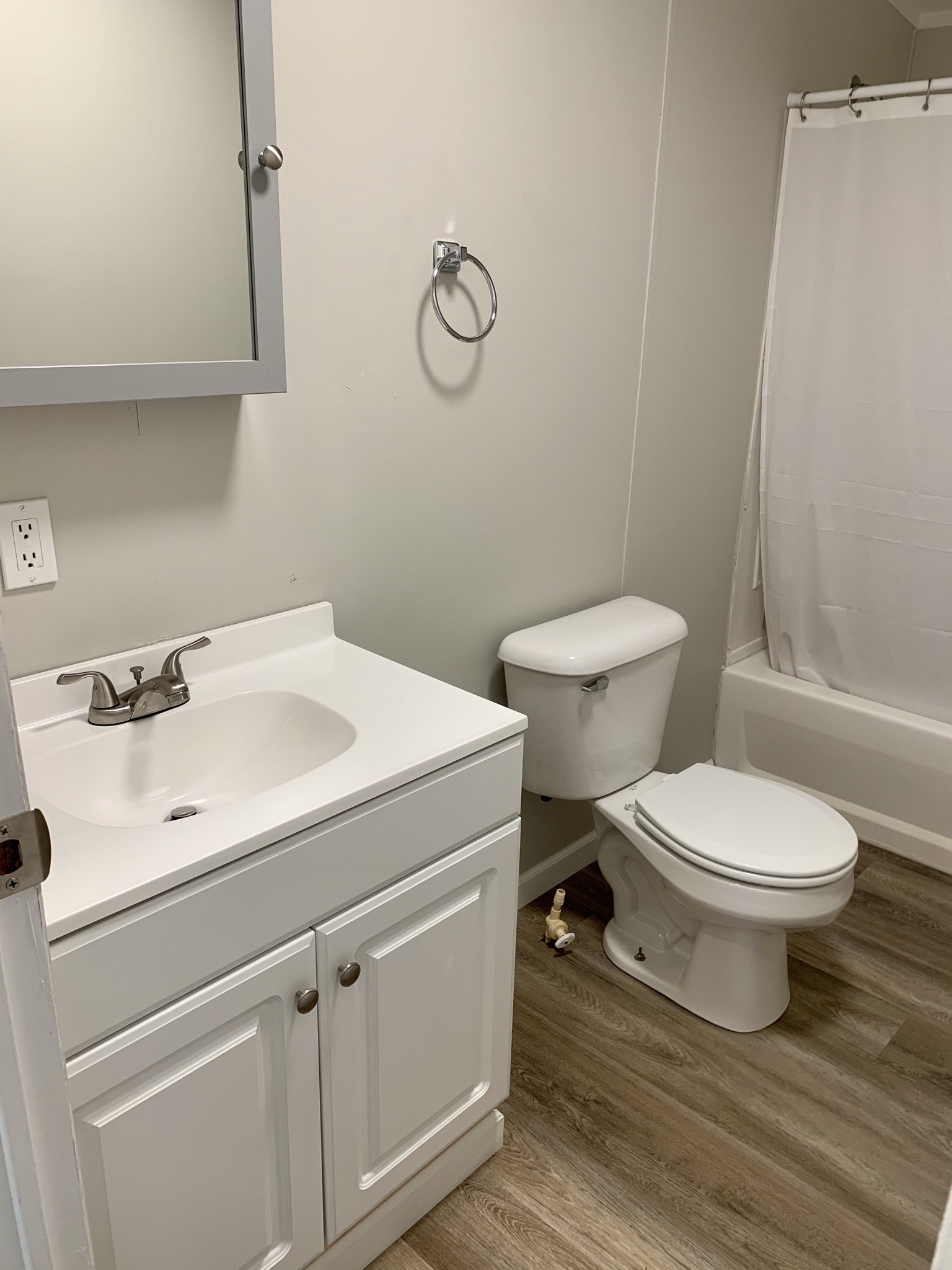 784 Speck Road Lebanon, TN 37087 - Photo 21 of 35 a white toilet sitting next to a bathroom sink
