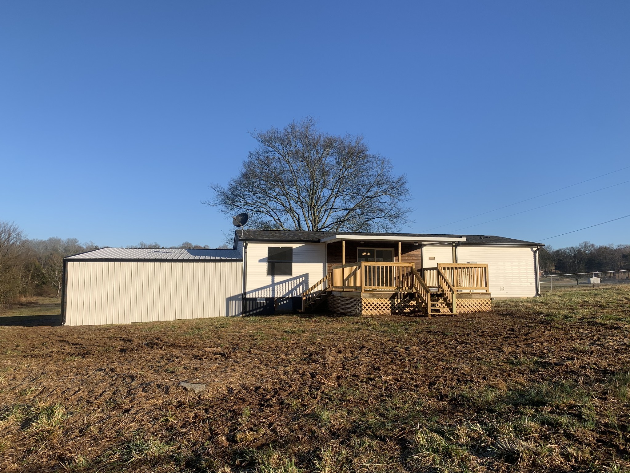 784 Speck Road Lebanon, TN 37087 - Photo 25 of 35 a backyard of a house with table and chairs