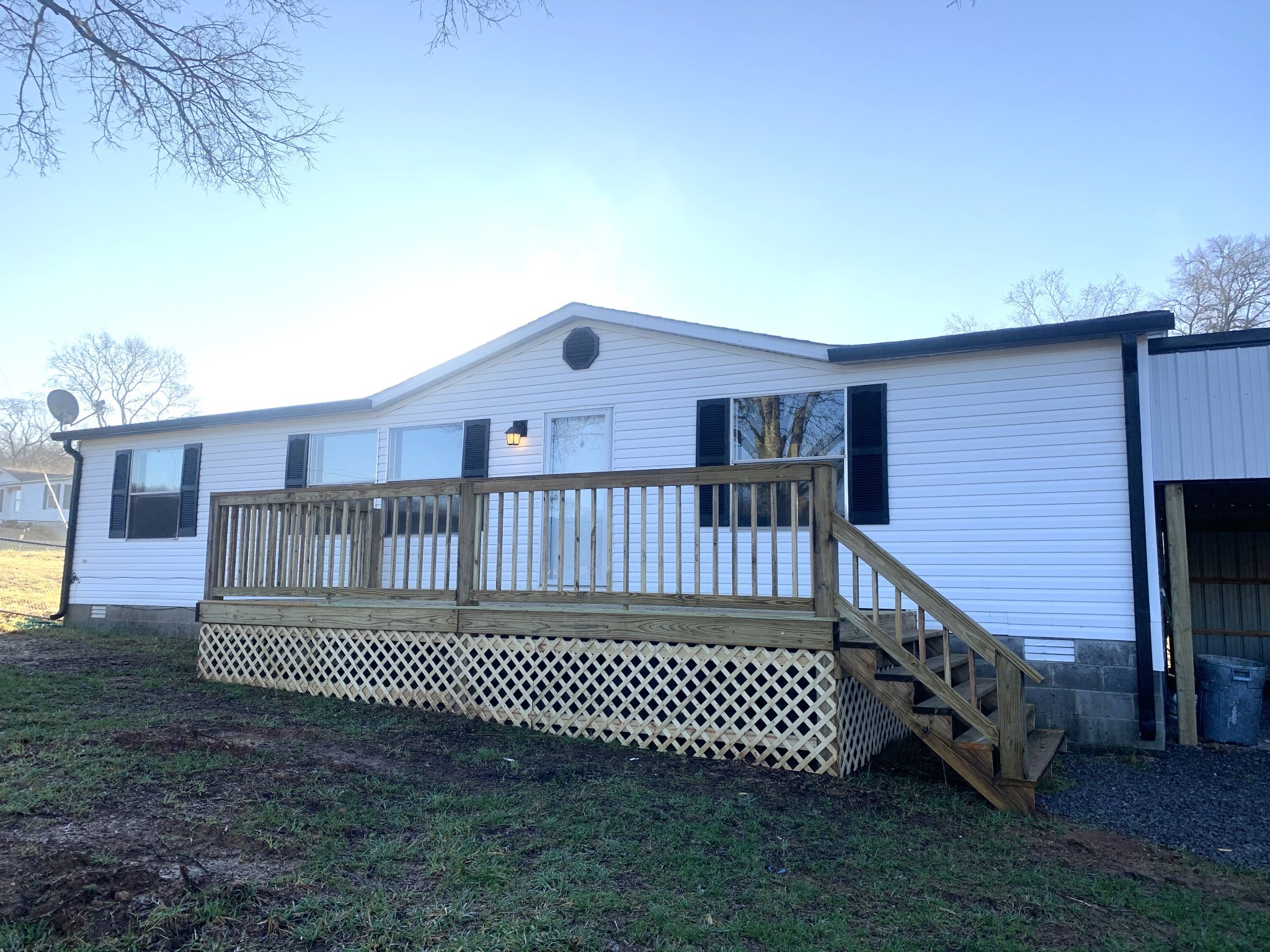 784 Speck Road Lebanon, TN 37087 - Photo 3 of 35 a view of a deck with a wooden fence