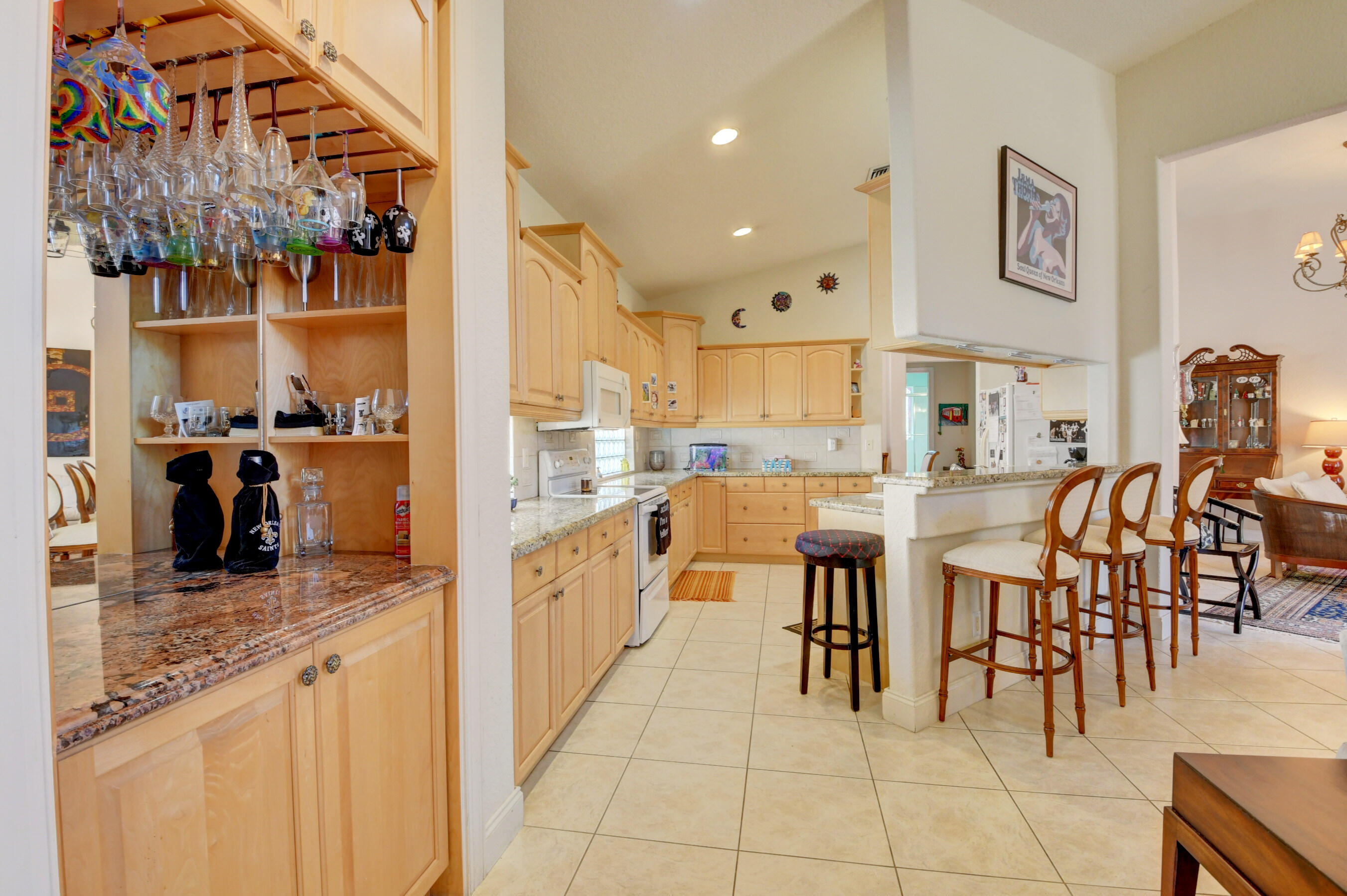 7080 Northwest Turtle Walk Boca Raton, FL 33487 - Photo 13 of 42 Open Kitchen w/ Eat Up Bar