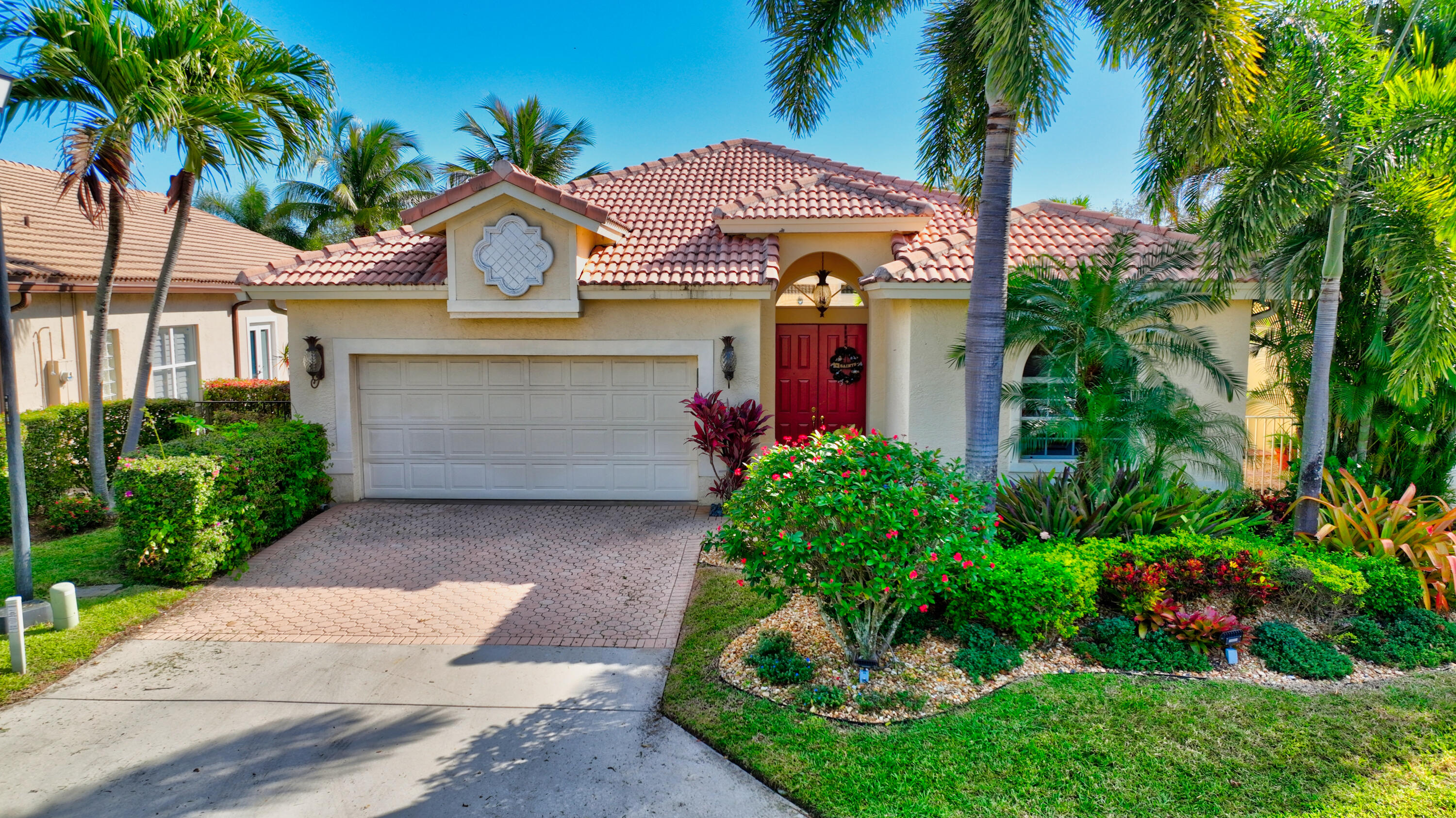 7080 Northwest Turtle Walk Boca Raton, FL 33487 - Photo 36 of 42 Two Car Garage & 2 Car Drive