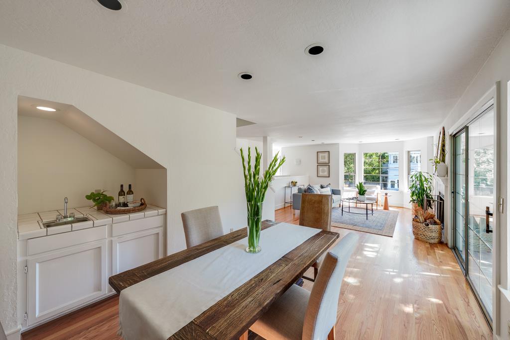 918 3rd Street, Unit A Santa Cruz, CA 95060 - Photo 14 of 43 a view of a dining room with furniture and a potted plant