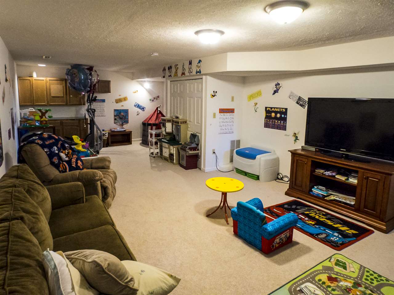 45 Oak Grove Road Palmyra, VA 22963 - Photo 13 of 25 a living room with furniture and a flat screen tv