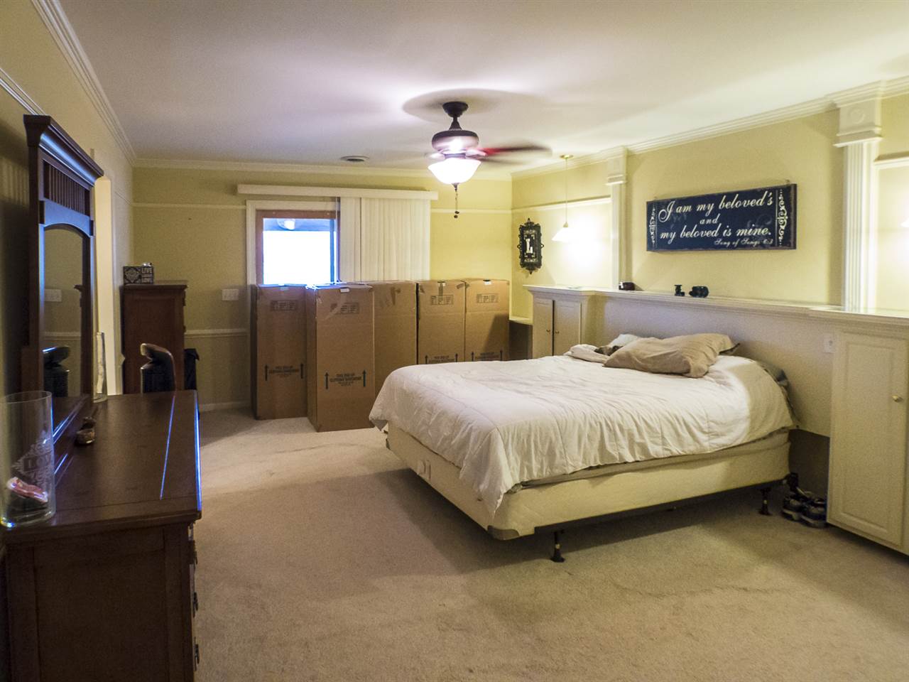 45 Oak Grove Road Palmyra, VA 22963 - Photo 18 of 25 a spacious bedroom with a bed and a flat screen television