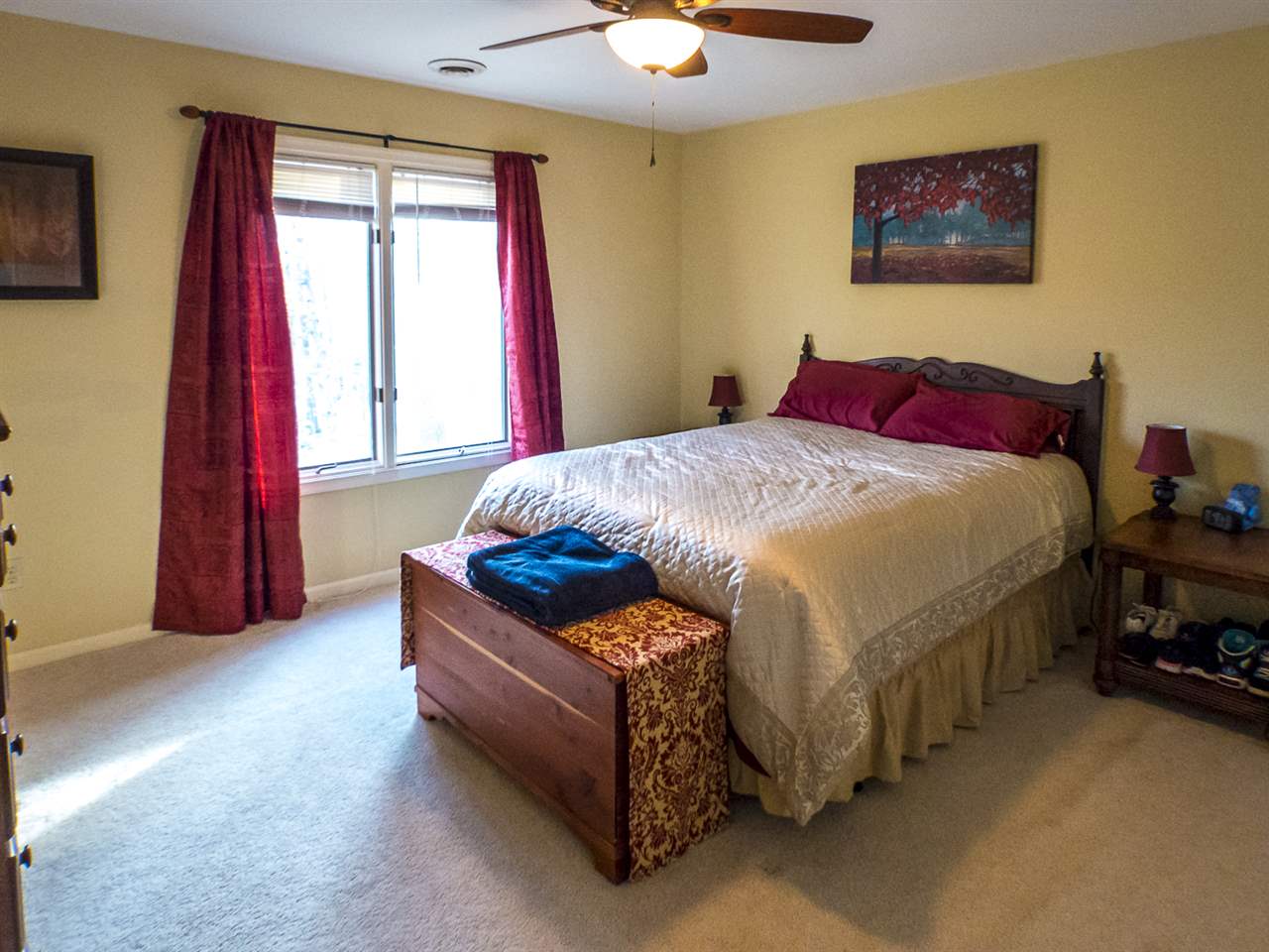 45 Oak Grove Road Palmyra, VA 22963 - Photo 24 of 25 a bed sitting in a bedroom next to a window