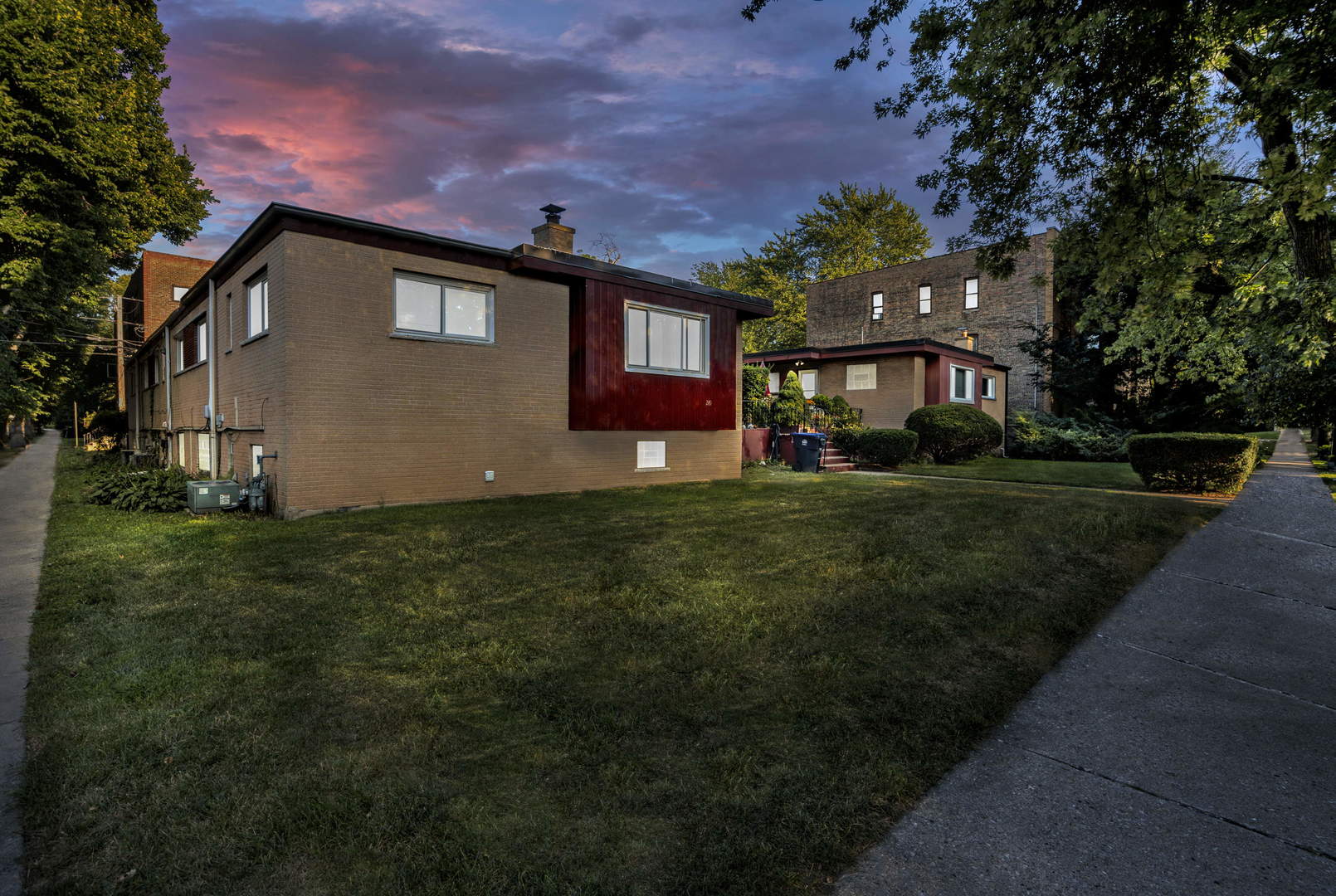 a house view with a garden space