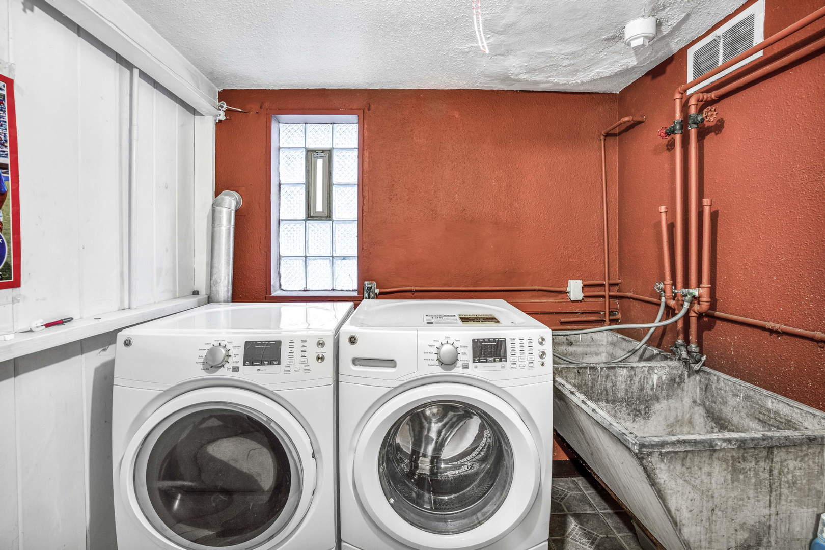 243 Custer Avenue Evanston, IL 60202 - Photo 15 of 17 a utility room with dryer and washer