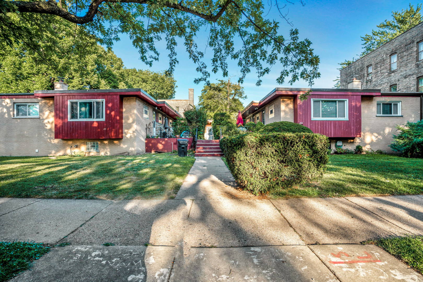 243 Custer Avenue Evanston, IL 60202 - Photo 2 of 17 a view of a house with a yard