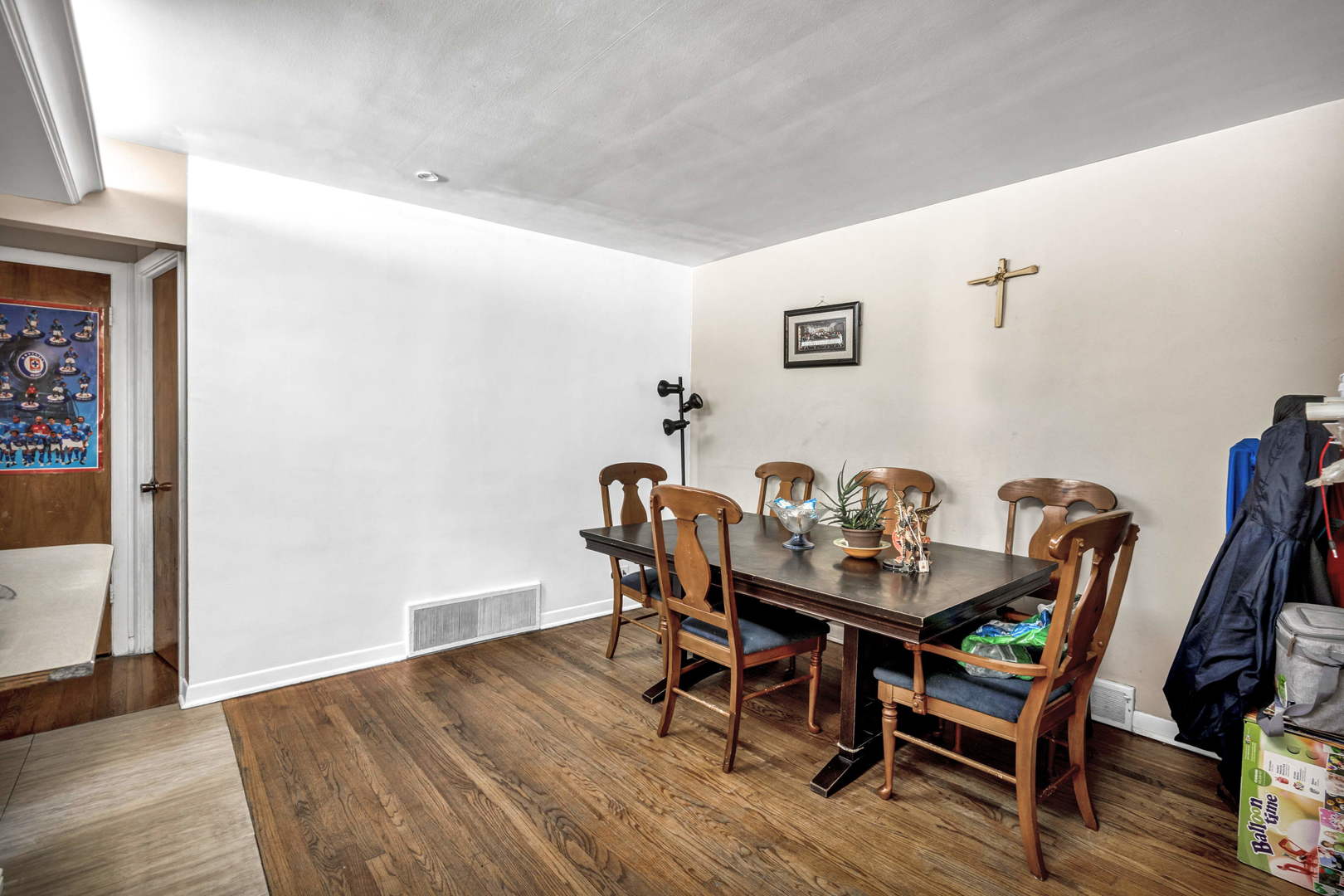 243 Custer Avenue Evanston, IL 60202 - Photo 6 of 17 a view of a dining room with furniture and wooden floor