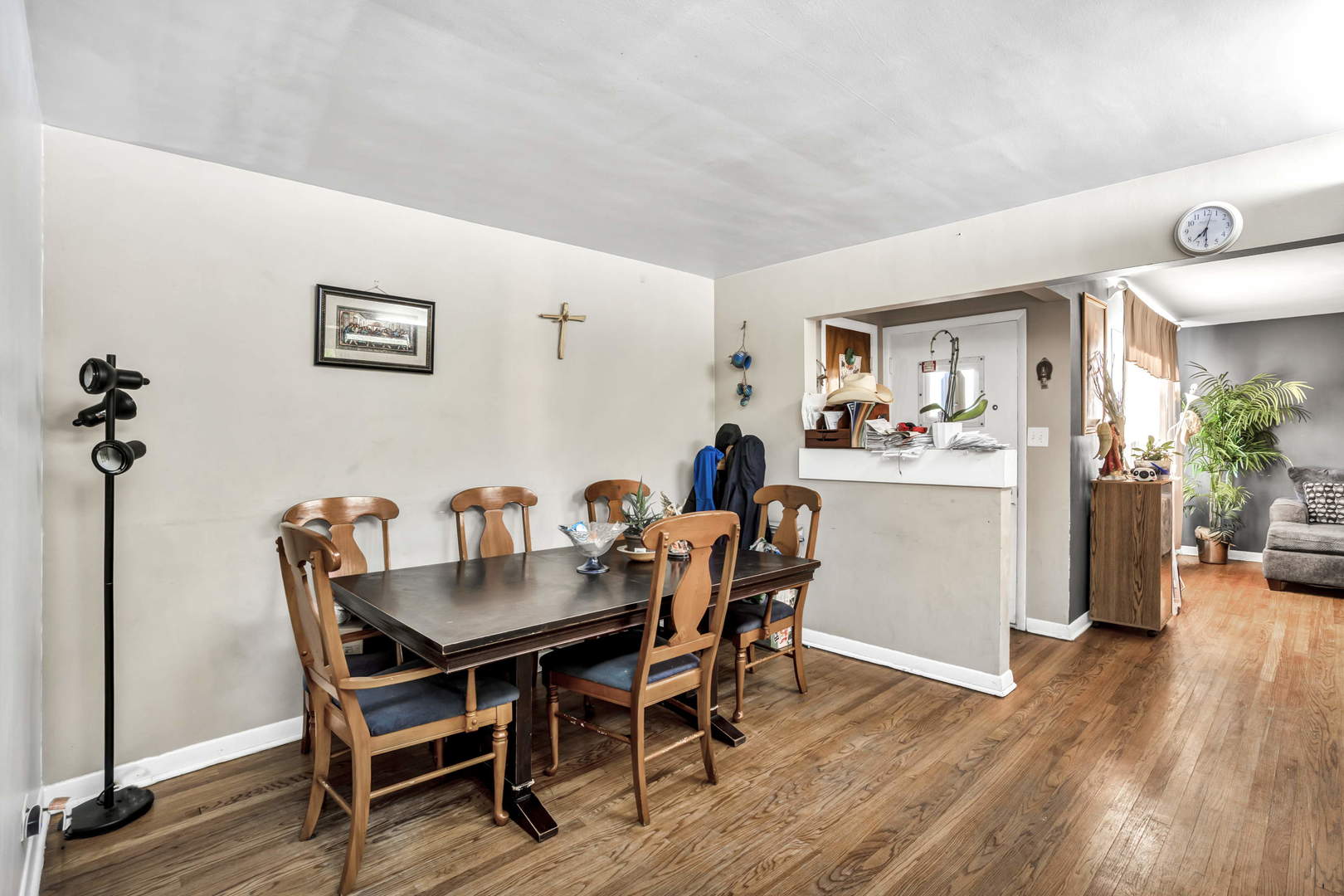 243 Custer Avenue Evanston, IL 60202 - Photo 7 of 17 a view of a dining room with furniture and wooden floor