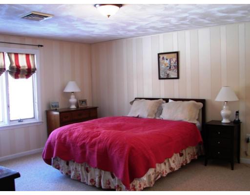35 Fitzpatrick Road Grafton, MA 01519 - Photo 9 of 11 a bed sitting in a bedroom next to a window