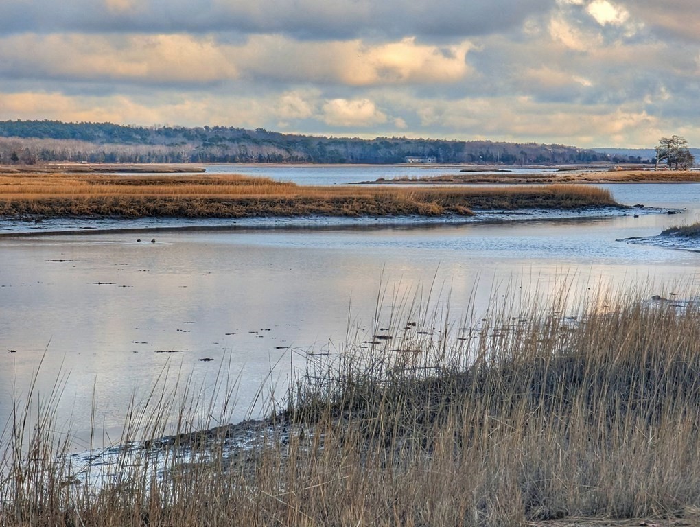 120 Cromesett Road Wareham, MA 02571 - Photo 3 of 12 a view of lake with mountain in the background