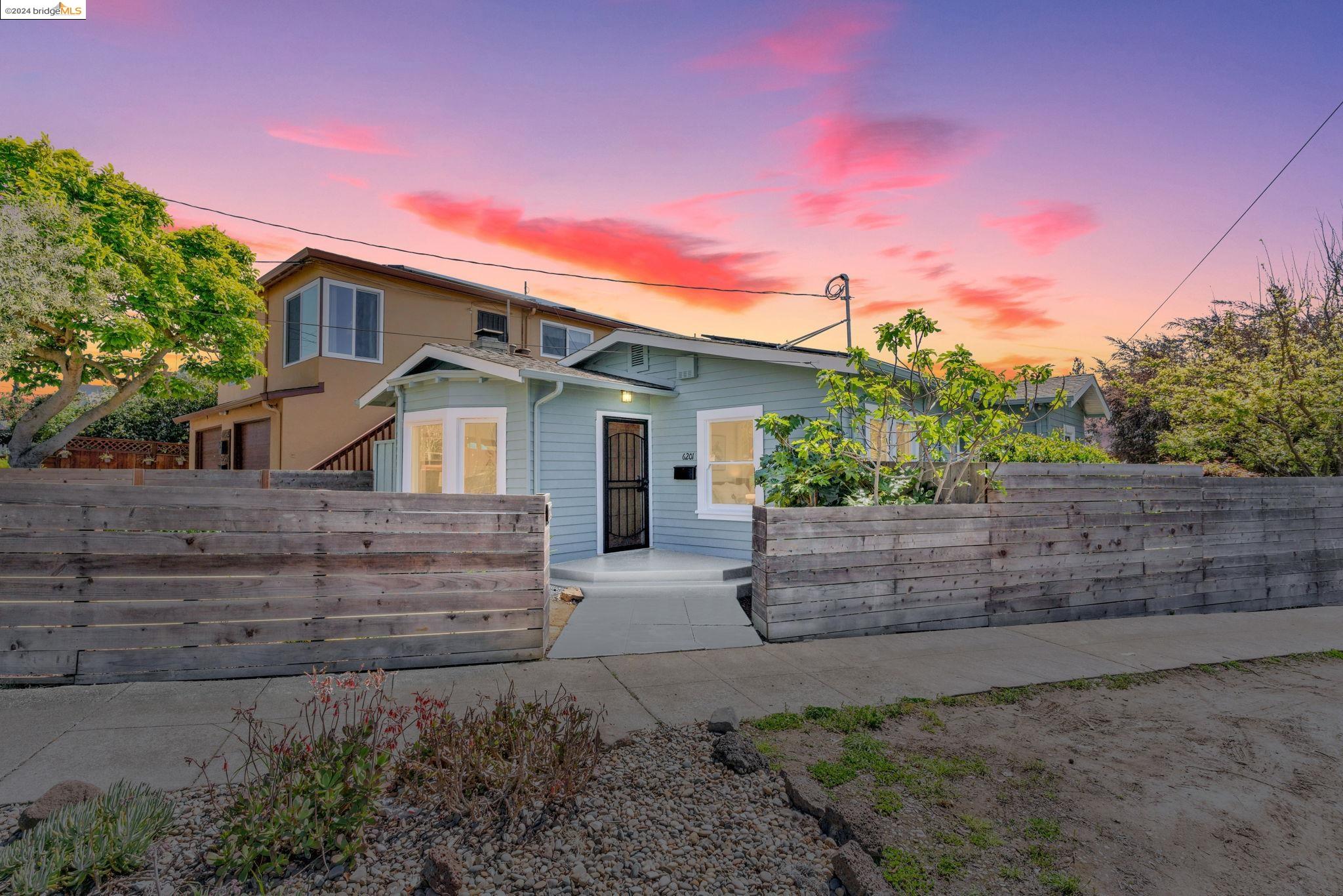 6201 Monadnock Way Oakland, CA 94605 - Photo 1 of 1 a front view of a house with a garden