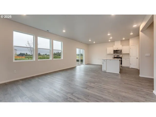 a kitchen with a wooden floor