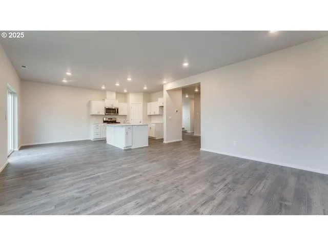 a kitchen with a sink and a vanity