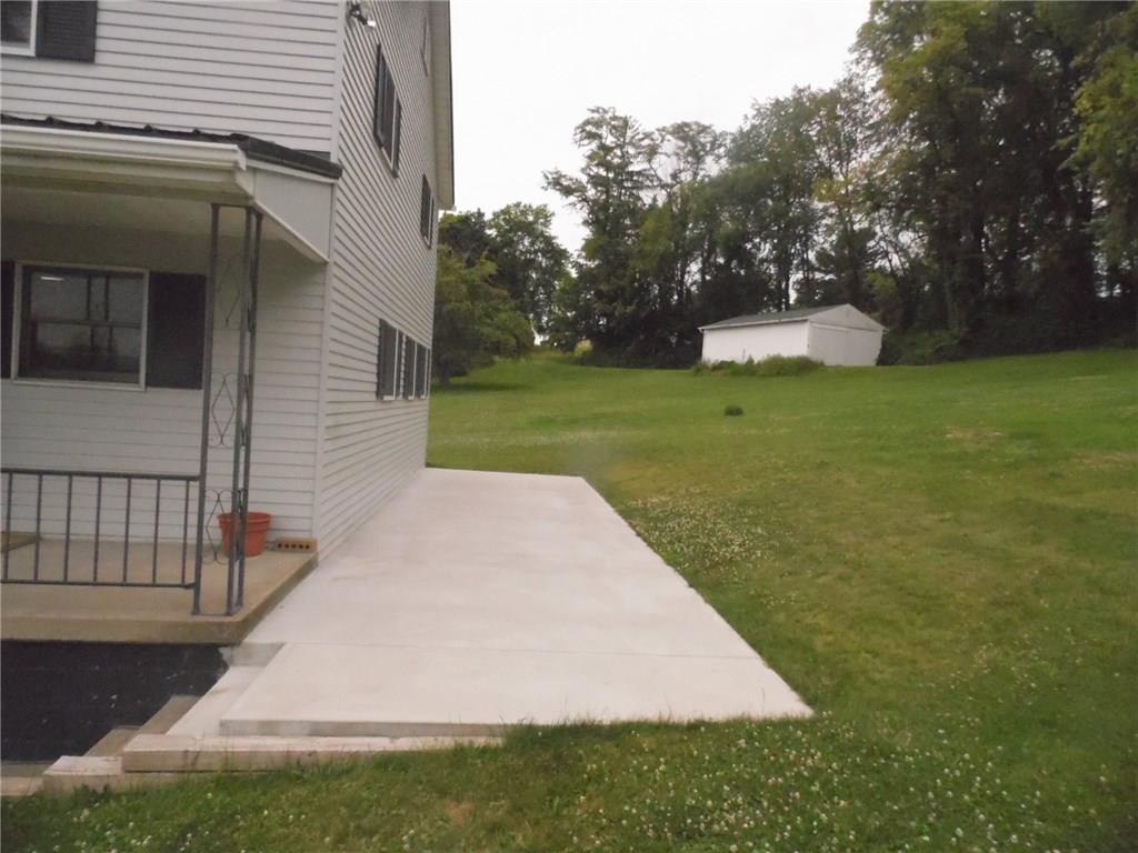 507 Kennedy Road Charleroi, PA 15022 - Photo 21 of 24 Covered side porch and 10x30 back patio. Public water and Septic system.