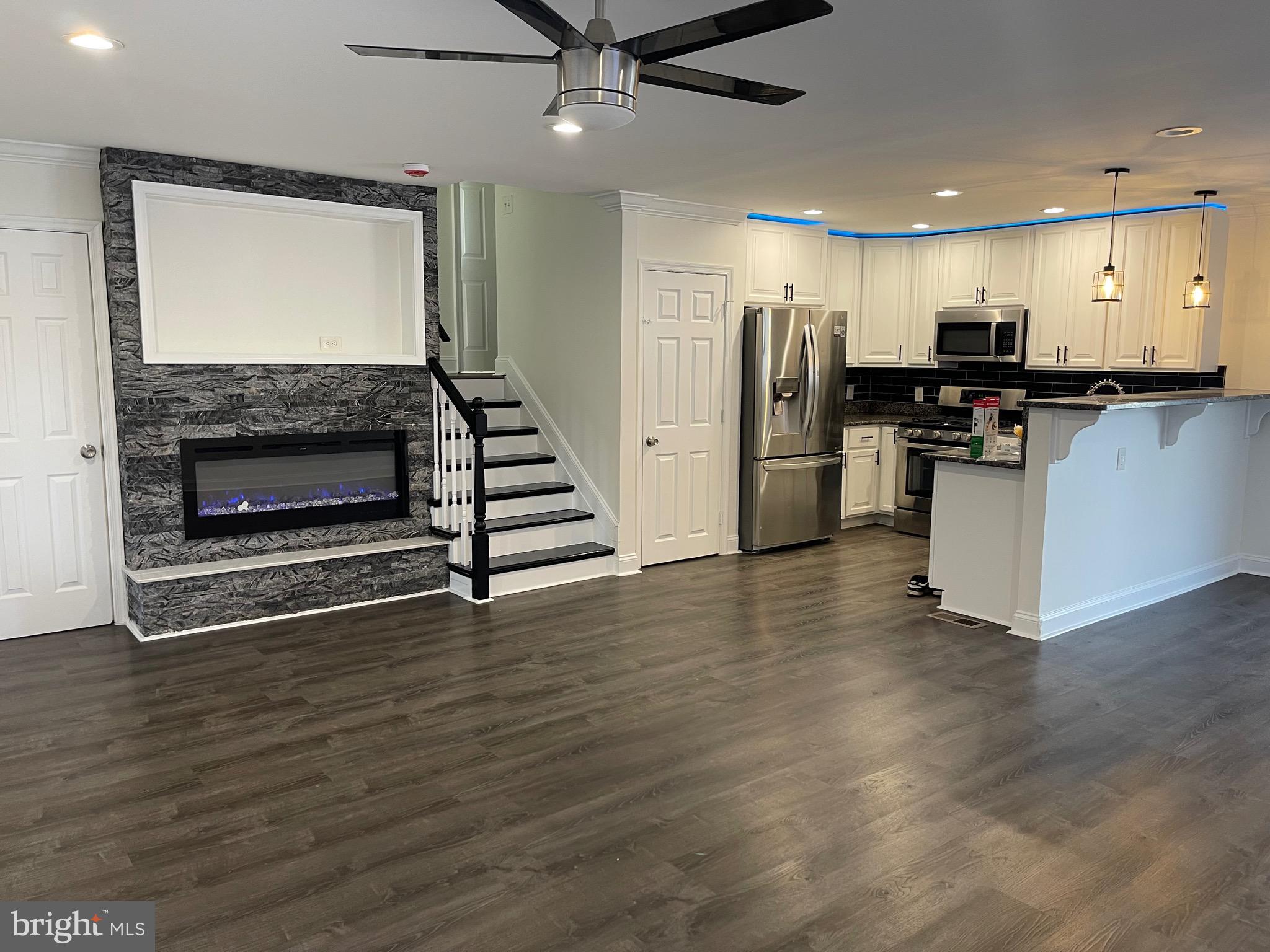 912 Marksworth Road Catonsville, MD 21228 - Photo 5 of 30 Living room with electric lead fireplace