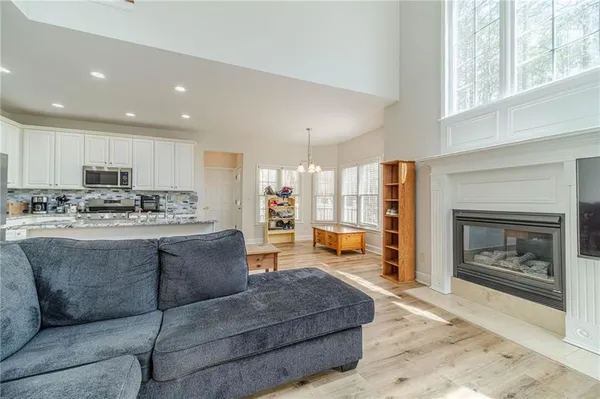 a bedroom with furniture and a window