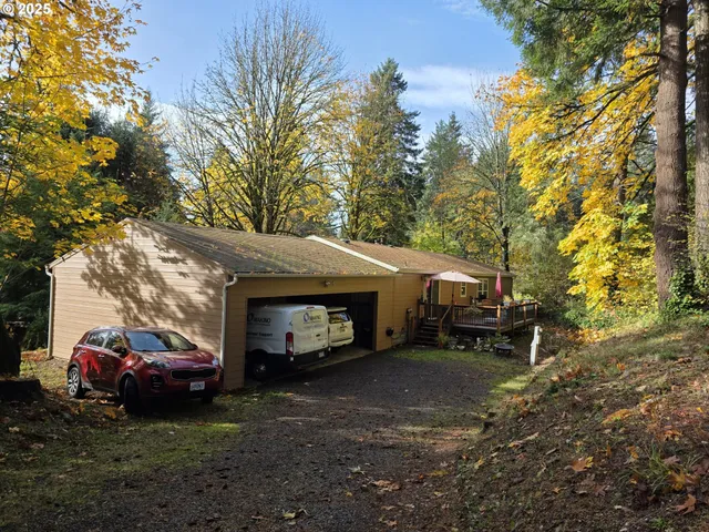 a view of a car park in front of house
