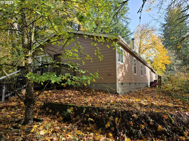 a backyard of a house with lots of green space