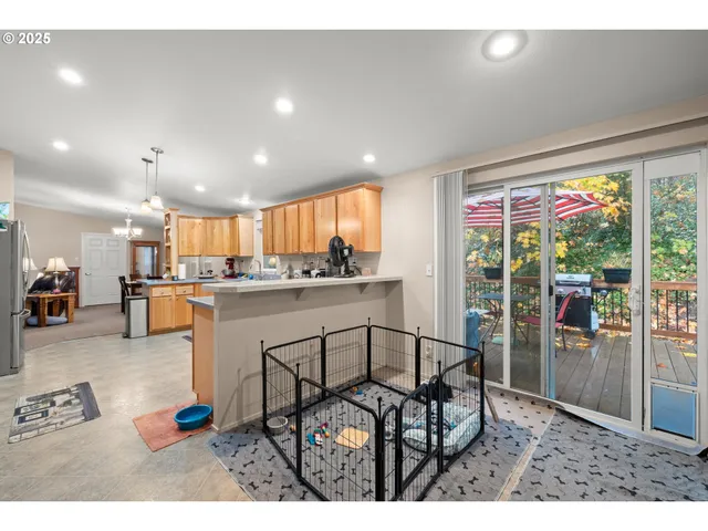 a kitchen with lots of counter top space and appliances