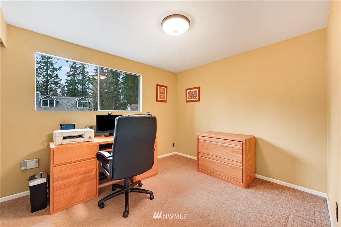 116 East Jonathan Road Bothell, WA 98012 - Photo 12 of 27 a view of workspace with wooden floor windows