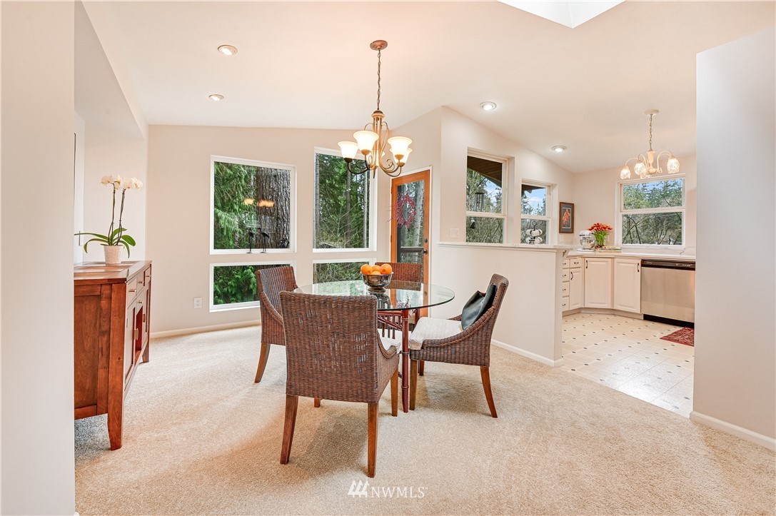 116 East Jonathan Road Bothell, WA 98012 - Photo 4 of 27 a dining room with furniture window wooden floor