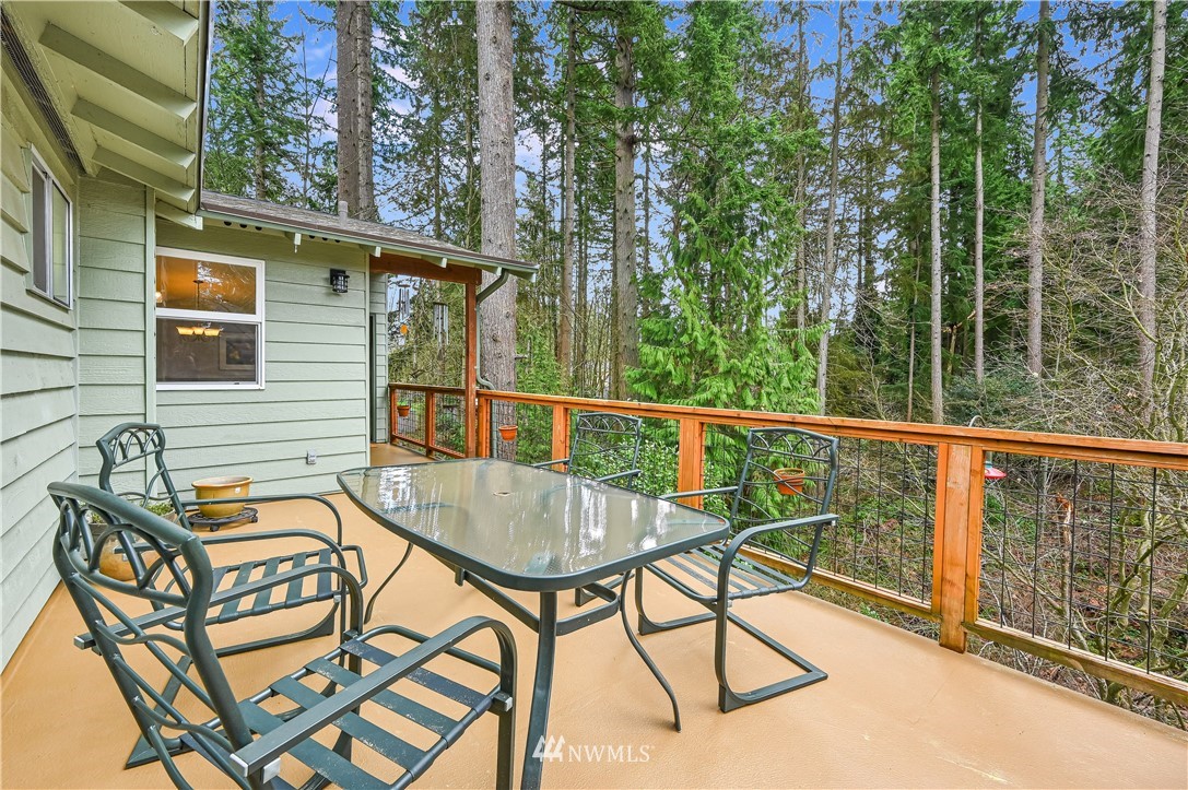 116 East Jonathan Road Bothell, WA 98012 - Photo 5 of 27 a view of a chairs and table in the balcony