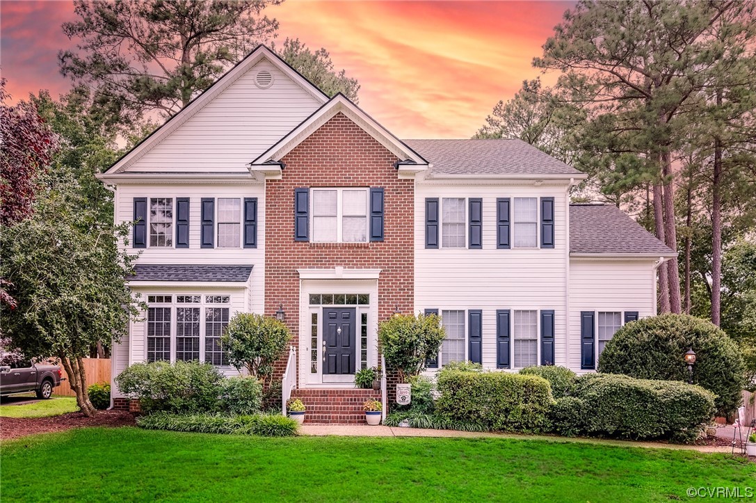 12118 Club Ridge Drive Chester, VA 23836 - Photo 1 of 38 View of front facade featuring a front yard
