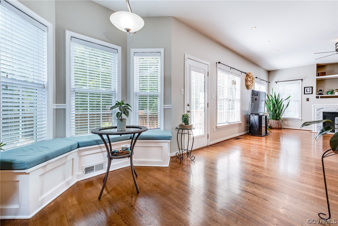 12118 Club Ridge Drive Chester, VA 23836 - Photo 12 of 38 Hardwood floored Breakfast nook, Built in bench, lots of natural light