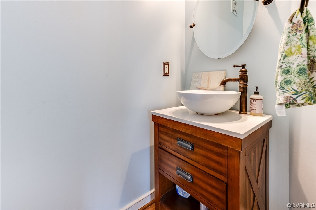 12118 Club Ridge Drive Chester, VA 23836 - Photo 16 of 38 Bathroom with Updated mirror and vanity