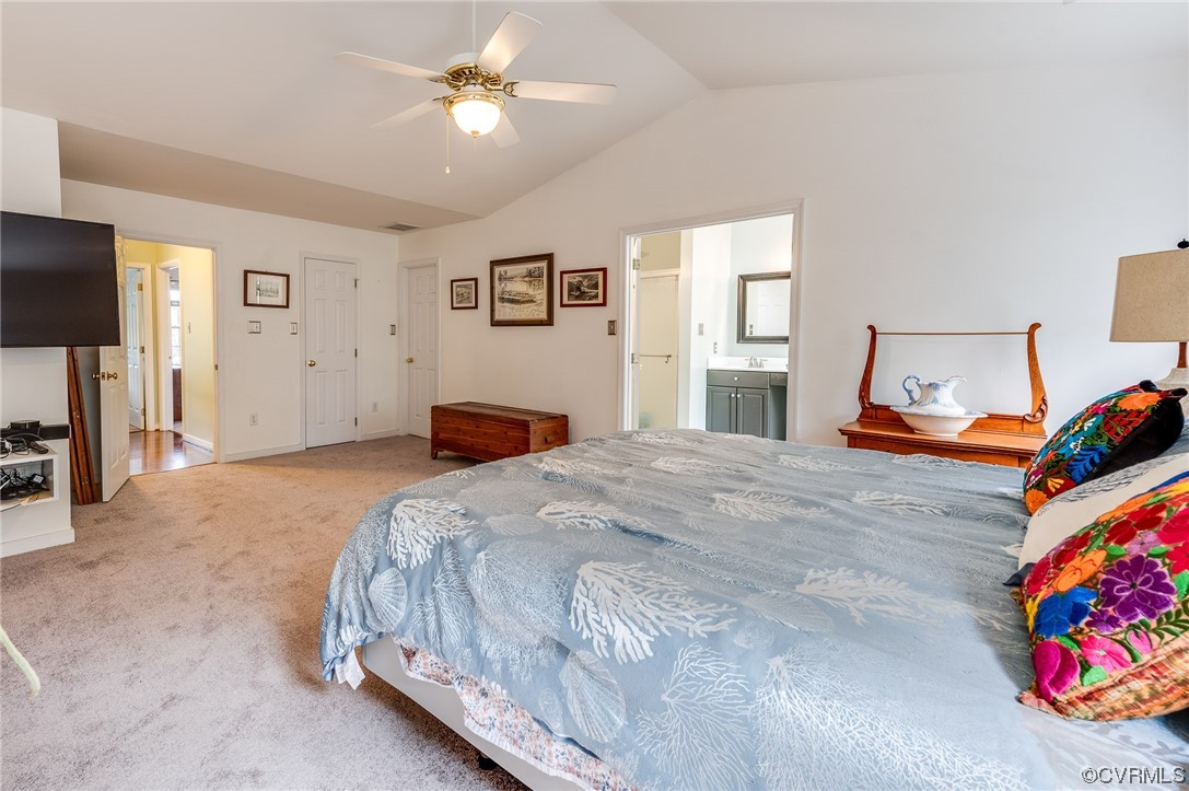 12118 Club Ridge Drive Chester, VA 23836 - Photo 18 of 38 Bedroom with lofted ceiling, Large His & Her closets