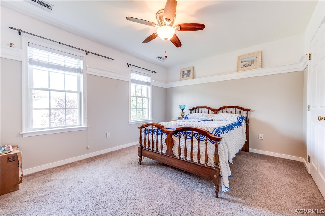 12118 Club Ridge Drive Chester, VA 23836 - Photo 22 of 38 2nd Bedroom featuring a decor shelf, ceiling fan, carpet, and natural light