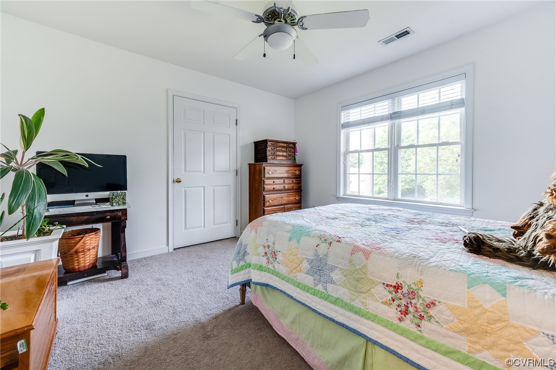 12118 Club Ridge Drive Chester, VA 23836 - Photo 23 of 38 3rd Carpeted bedroom featuring a ceiling fan, natural light