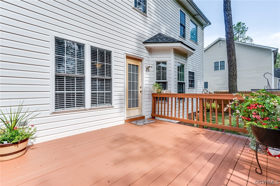 12118 Club Ridge Drive Chester, VA 23836 - Photo 27 of 38 View of deck, with large fenced in level lot