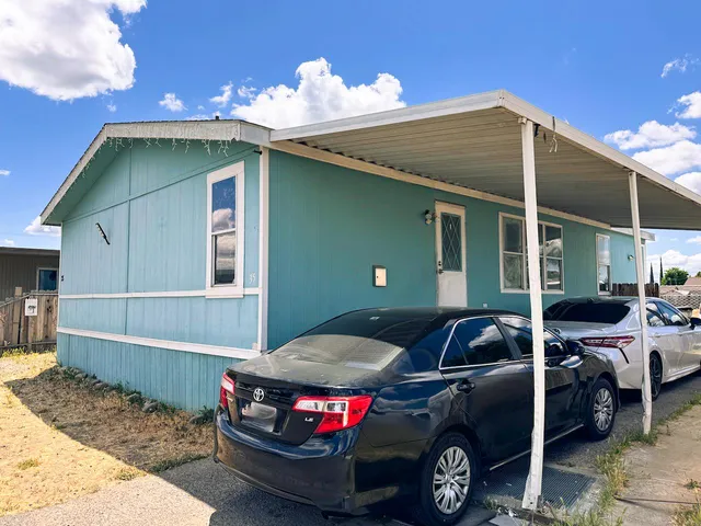 a car parked in front of a house