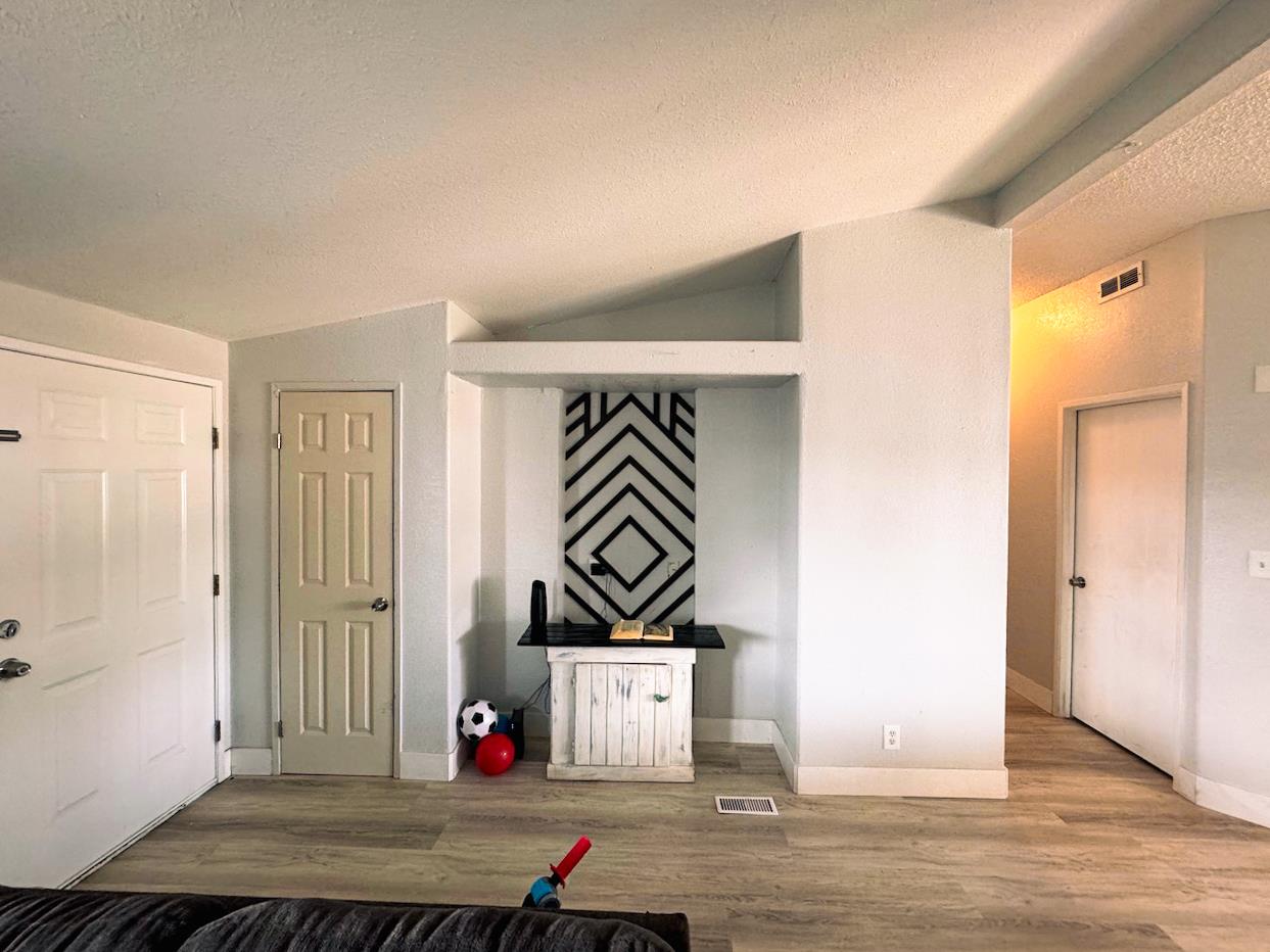 3939 Central Avenue, Unit 35 Ceres, CA 95307 - Photo 11 of 36 a view of an entryway with wooden floor