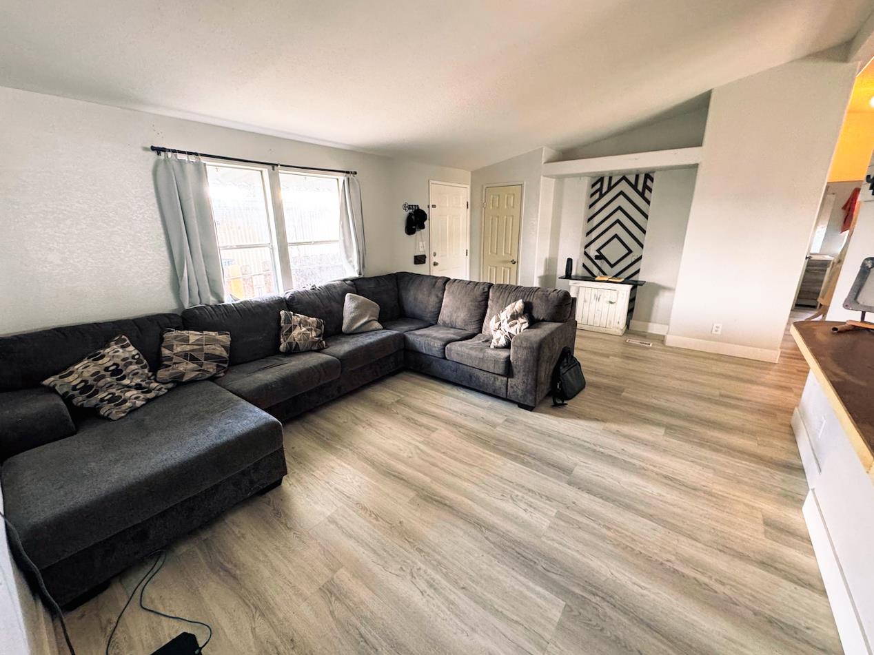3939 Central Avenue, Unit 35 Ceres, CA 95307 - Photo 14 of 36 a living room with furniture and a window