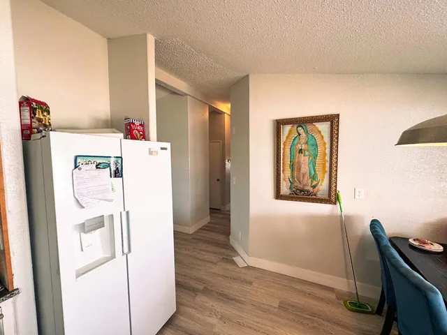 a utility room with closet dryer and washer