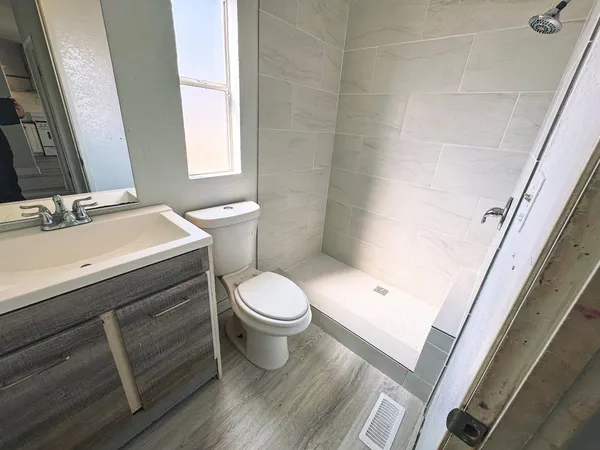 a bathroom with a sink and a toilet