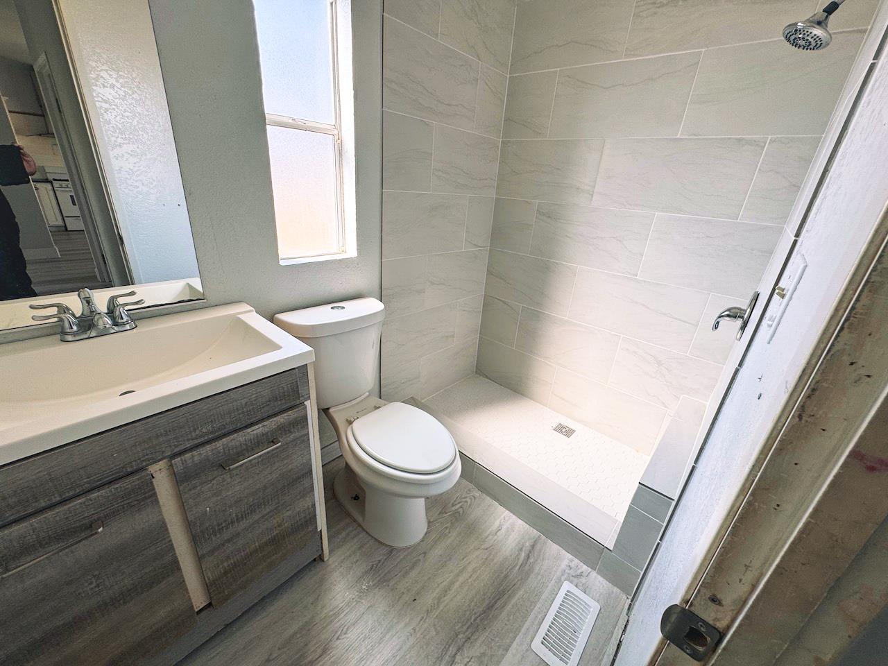 3939 Central Avenue, Unit 35 Ceres, CA 95307 - Photo 31 of 36 a bathroom with a sink and a toilet