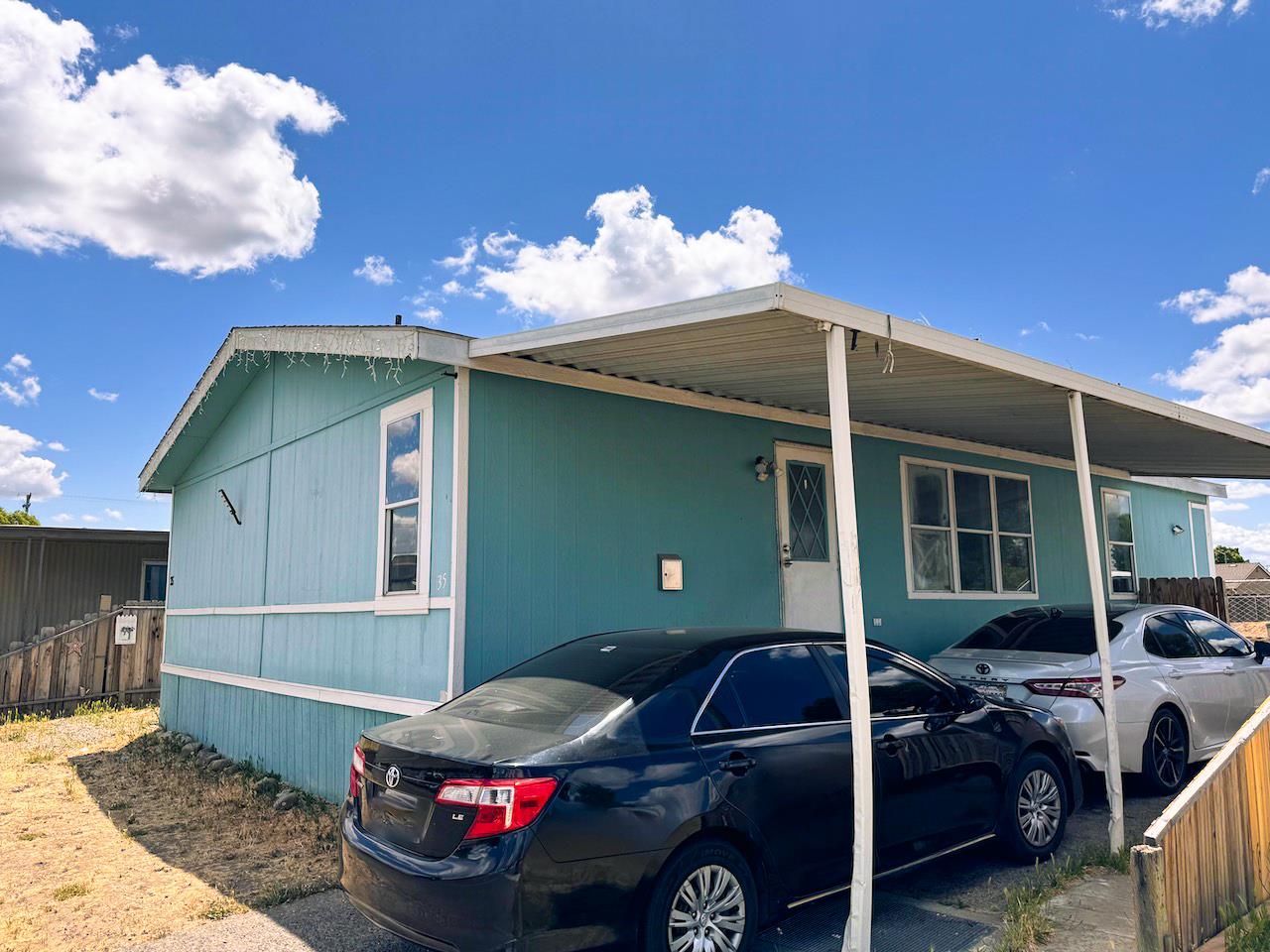 3939 Central Avenue, Unit 35 Ceres, CA 95307 - Photo 35 of 36 a front view of a house with yard