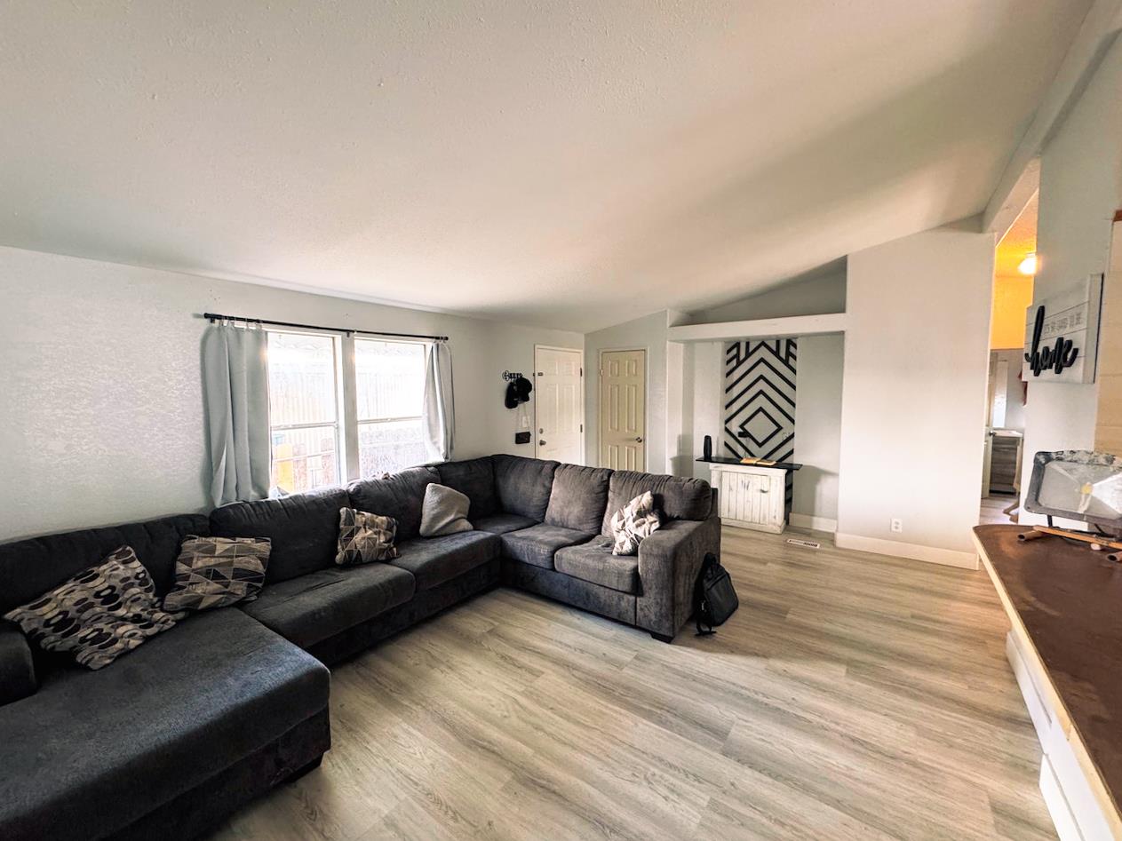 3939 Central Avenue, Unit 35 Ceres, CA 95307 - Photo 8 of 36 a living room with furniture and a window