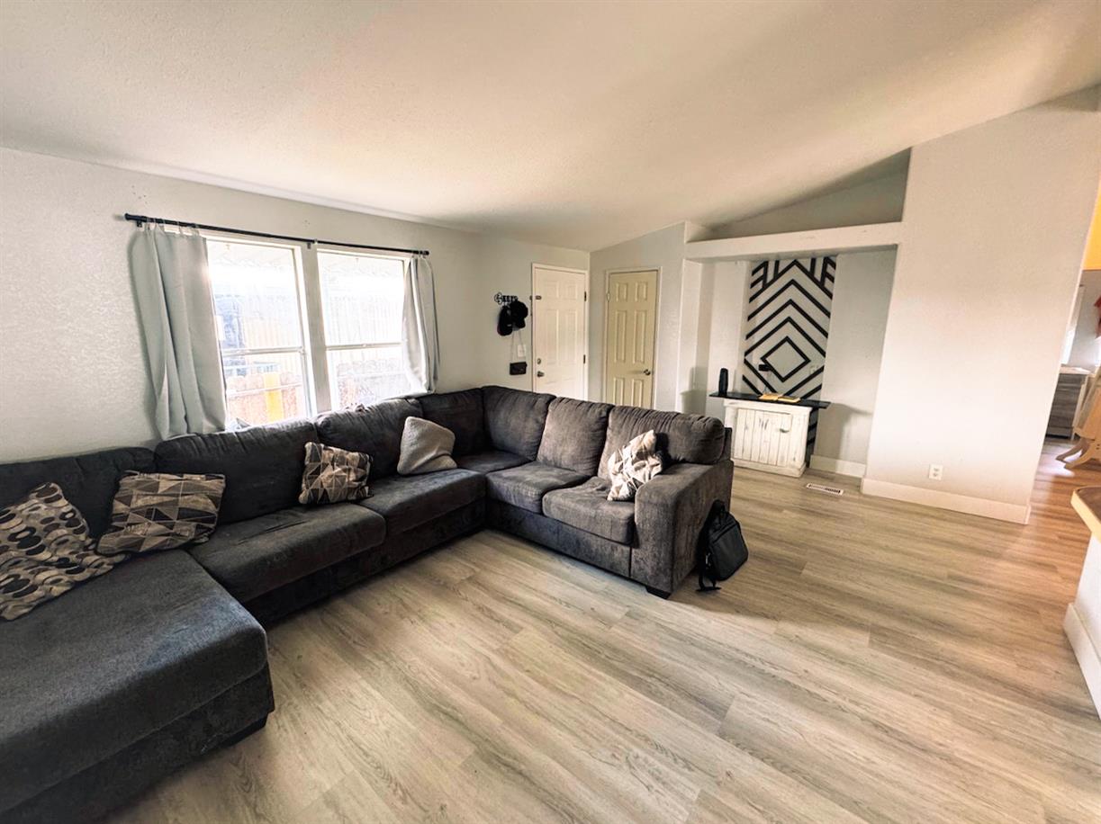3939 Central Avenue, Unit 35 Ceres, CA 95307 - Photo 10 of 36 a living room with furniture and a window