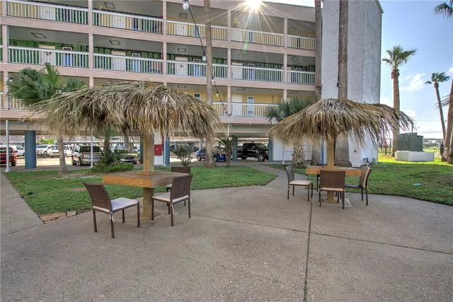 a couple of table and chairs in the garden