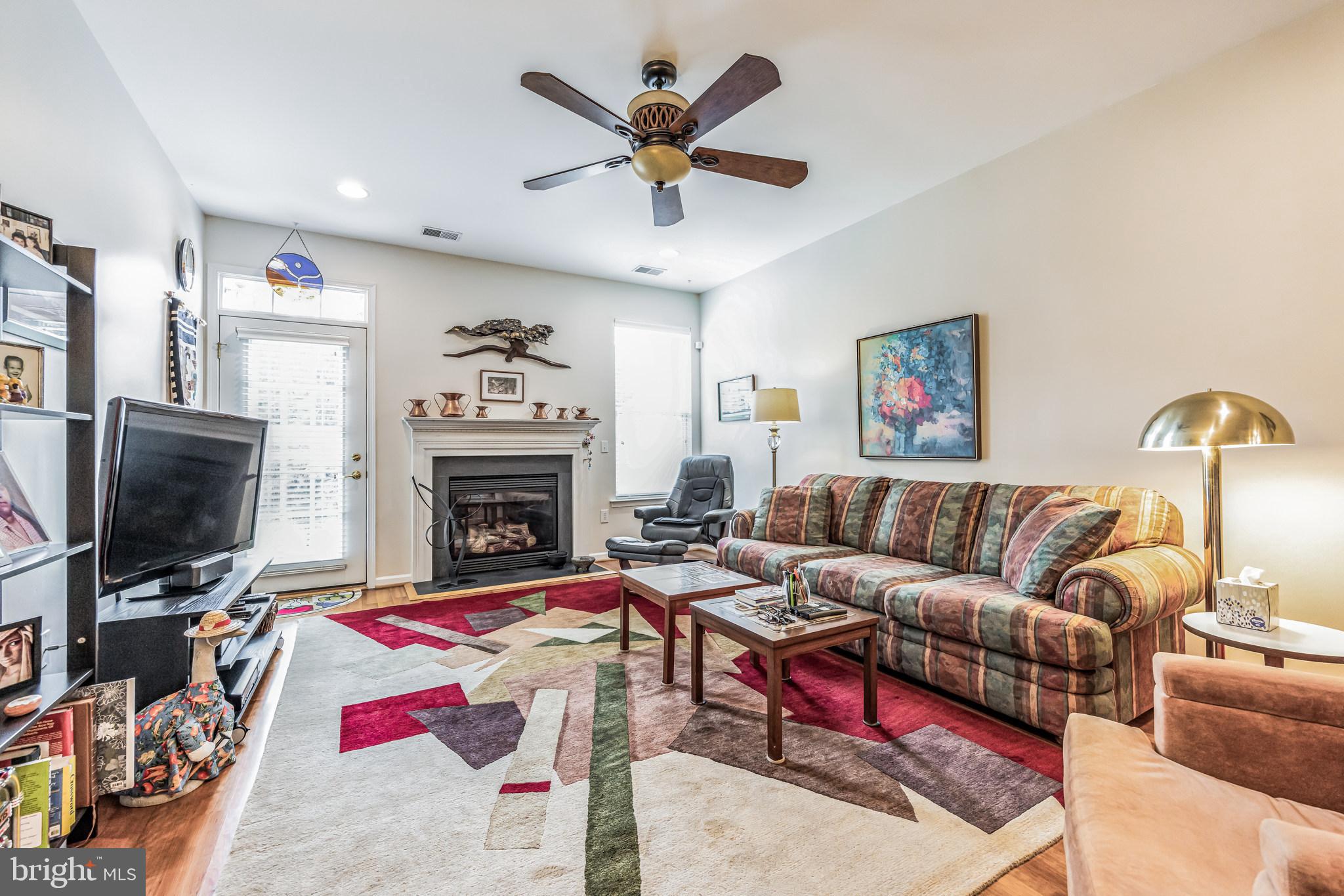 1612 Boxwood Road Garnet Valley, PA 19060 - Photo 12 of 33 Family Room with Fireplace and access to patio