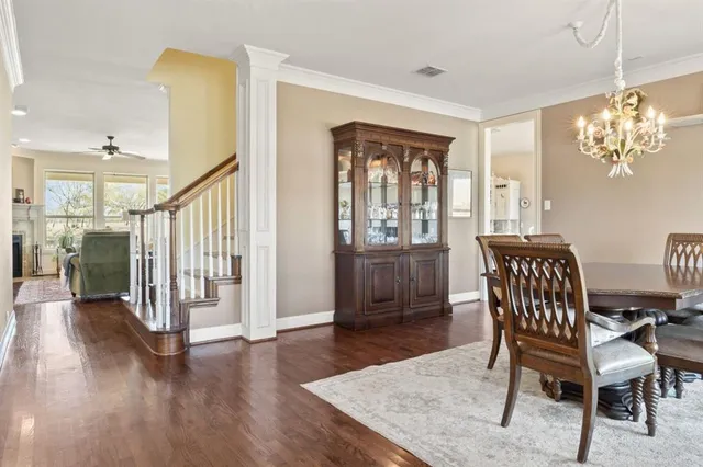 a view of a livingroom with furniture window and wooden floor
