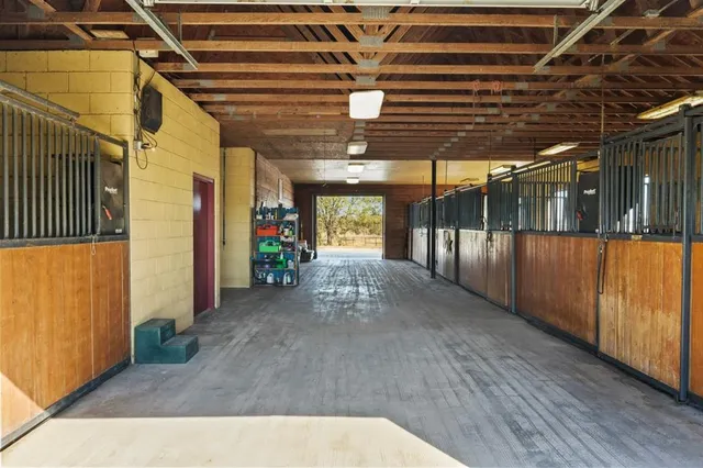 a front view of a residential apartment building with a yard