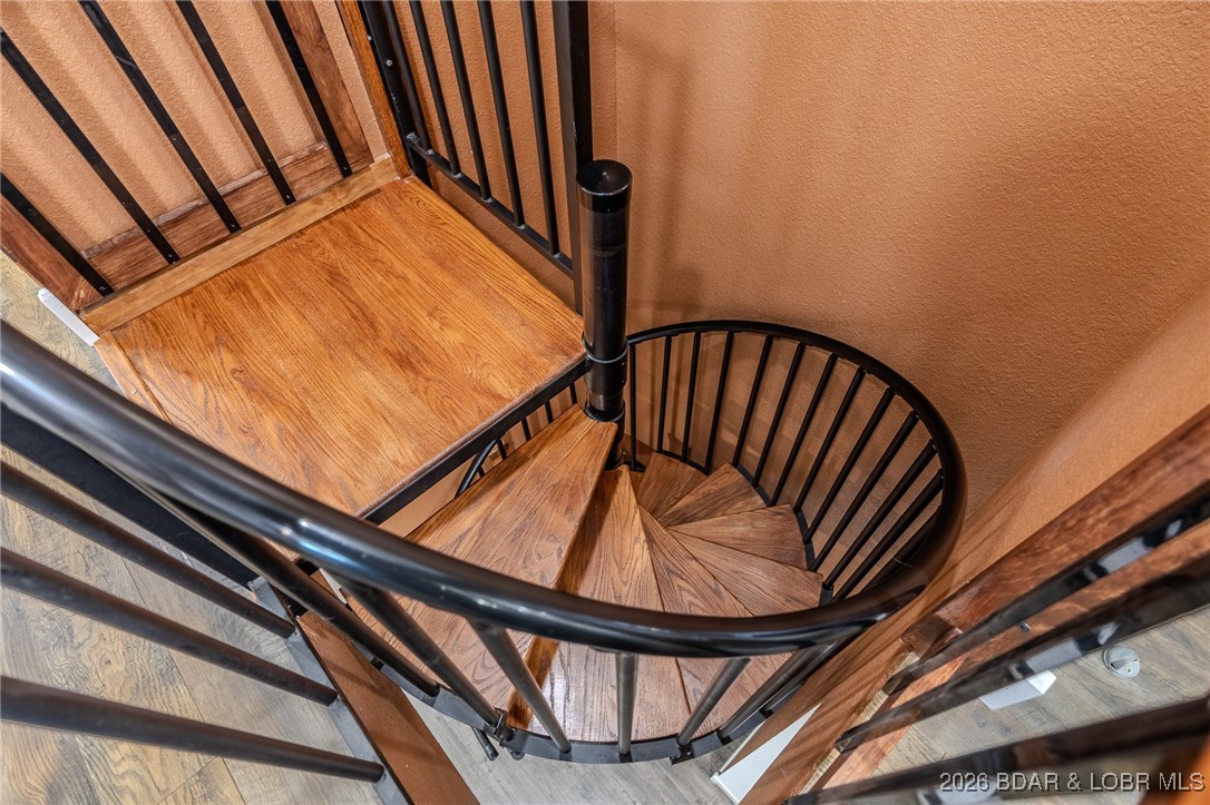 81 Restless Point Camdenton, MO 65020 - Photo 42 of 75 Custom Paragon spiral staircase.